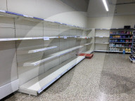 Empty shelves in a Tesco supermarket in east London after shoppers panic buy essential items as they prepare for a potential UK lockdown for an oncoming coronavirus outbreak and self isolation.
