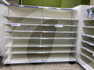 Empty shelves in a Tesco supermarket in east London after shoppers panic buy essential items as they prepare for a potential UK lockdown for an oncoming coronavirus outbreak and self isolation.

