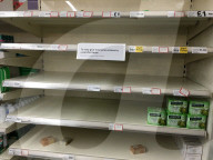 Empty shelves in a Tesco supermarket in east London after shoppers panic buy essential items as they prepare for a potential UK lockdown for an oncoming coronavirus outbreak and self isolation.
