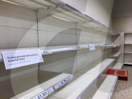 Empty shelves in a Tesco supermarket in east London after shoppers panic buy essential items as they prepare for a potential UK lockdown for an oncoming coronavirus outbreak and self isolation.
