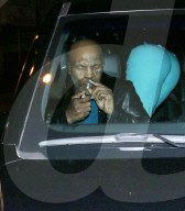 Mike Tyson Smokes A Rolled Cigarette After Dinner At Craig's