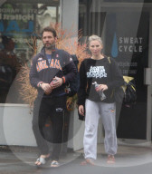 LA Rain ain t going to stop Jason Priestley and his Wife/Trainer Naomi Lowde-Priestley from hitting the gym for an early morning workout in Los Angeles