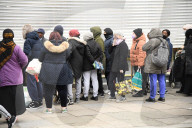 Queues outside a Saver Centre in Willesden