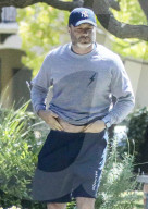 PREMIUM EXCLUSIVE Liev Schreiber reaaranging himself