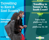 Train travellers at Victoria Station wear protective masks