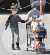 PREMIUM EXCLUSIVE DeniseRichards loading on toilet paper amid corona virus crisis