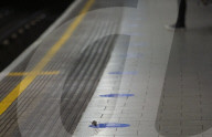 Mouse on empty tube platform during London lockdown