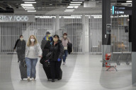 Luton airport briefly bursts into life, as Wizz Air flies in from Bulgaria.