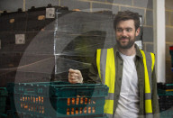 Comedian Jack Whitehall with volunteers from the Felix Project.