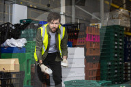 Comedian Jack Whitehall with volunteers from the Felix Project.