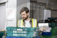 Comedian Jack Whitehall with volunteers from the Felix Project.