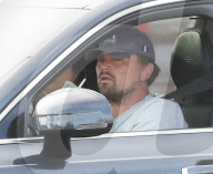 PREMIUM EXCLUSIVE Leonardo spotted in Malibu with mom in the back of his car