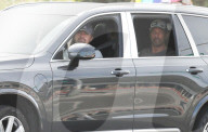 PREMIUM EXCLUSIVE Leonardo spotted in Malibu with mom in the back of his car