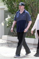 Matthew Perry looks tired as he steps out for an afternoon smoke break with a female friend. 