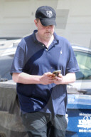 Matthew Perry looks tired as he steps out for an afternoon smoke break with a female friend. 