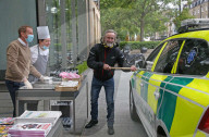 Celebrity Chef Marcus Wareing and his Team hand out freshly prepared cooked food and refreshments to 999 Emergency Workers