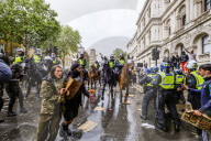 Large protest with over 15,000 for George Floyd in the centre of London. Protesters split into different groups.  Police horses charged the crowd in front of Downing St and projectiles were thrown.