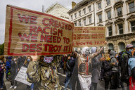 Large protest with over 15,000 for George Floyd in the centre of London. Protesters split into different groups.  Police horses charged the crowd in front of Downing St and projectiles were thrown.