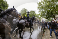 Large protest with over 15,000 for George Floyd in the centre of London. Protesters split into different groups.  Police horses charged the crowd in front of Downing St and projectiles were thrown.