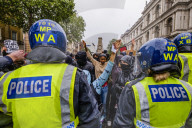 Large protest with over 15,000 for George Floyd in the centre of London. Protesters split into different groups.  Police horses charged the crowd in front of Downing St and projectiles were thrown.