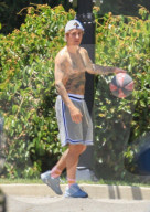 Justin Bieber playing basketball with friends