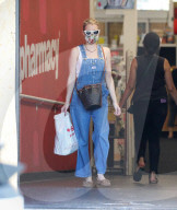 PREMIUM EXCLUSIVE Emma Roberts Looks Super Cute In Overalls During CVS Run