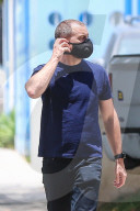 Joshua Jackson debuts a brand new buzzcut as he waits to meet a friend for lunch in Beverly Hills.