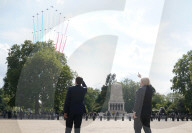 Boris Johnson and President Macron watch a flypast by The Red Arrows and their French counterparts La Patrouille