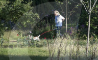 Boris Johnson running this morning with dog Dilyn.