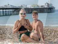 People flock to Brighton beach as the heatwave across the UK continues