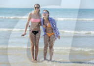 People flock to Brighton beach as the heatwave across the UK continues