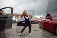 Drive-in bingo for NHS staff and key workers. The photographer Christopher Thomond spends an evening with visitors to the first Bingo Bedlam, a physically distanced drive-in bingo and singalong music session for NHS employees and other key workers, held d