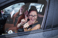 Drive-in bingo for NHS staff and key workers. The photographer Christopher Thomond spends an evening with visitors to the first Bingo Bedlam, a physically distanced drive-in bingo and singalong music session for NHS employees and other key workers, held d
