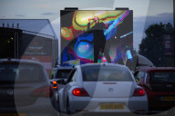 Drive-in bingo for NHS staff and key workers. The photographer Christopher Thomond spends an evening with visitors to the first Bingo Bedlam, a physically distanced drive-in bingo and singalong music session for NHS employees and other key workers, held d