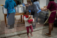 Hungry Little Mouths: Mama Cindy's Soup Kitchen feeding the children of Hout Bay, Cape Town, South Africa.