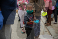 Hungry Little Mouths: Mama Cindy's Soup Kitchen feeding the children of Hout Bay, Cape Town, South Africa.