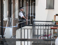 Mitcham incident: Child, 4, dies and woman fights for life after being found injured in south London home