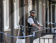 Mitcham incident: Child, 4, dies and woman fights for life after being found injured in south London home