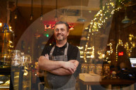 Baker Andrew Twentyman at his pizza restaurant and bakery in Leigh, Greater Manchester.