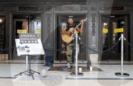 'There's money to be made': buskers return to Britain's high streets 