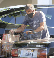 PREMIUM EXCLUSIVE Olivier Martinez Reloads On Toilet Paper And Bottled Water At Gelson's