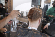 Locks off! London barbers reopen after lockdown - photo essay. Photographer Christian Sinibaldi went to five salons and met some of their first clients in need of a trim.