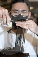 Locks off! London barbers reopen after lockdown - photo essay. Photographer Christian Sinibaldi went to five salons and met some of their first clients in need of a trim.