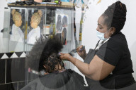 Locks off! London barbers reopen after lockdown - photo essay. Photographer Christian Sinibaldi went to five salons and met some of their first clients in need of a trim.
