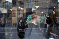 Locks off! London barbers reopen after lockdown - photo essay. Photographer Christian Sinibaldi went to five salons and met some of their first clients in need of a trim.