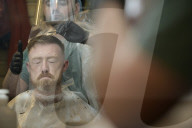 Locks off! London barbers reopen after lockdown - photo essay. Photographer Christian Sinibaldi went to five salons and met some of their first clients in need of a trim.