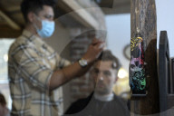 Locks off! London barbers reopen after lockdown - photo essay. Photographer Christian Sinibaldi went to five salons and met some of their first clients in need of a trim.