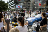 Beijing lowers public health epidemic emergency 