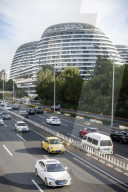 Beijing lowers public health epidemic emergency 