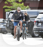 PREMIUM EXCLUSIVE Arnold Schwarzenegger And Heather Milligan Work Up A Sweat With An Afternoon Bike Ride